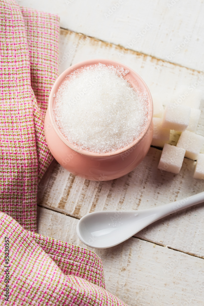 Sugar on wooden background Sugar on wooden background
