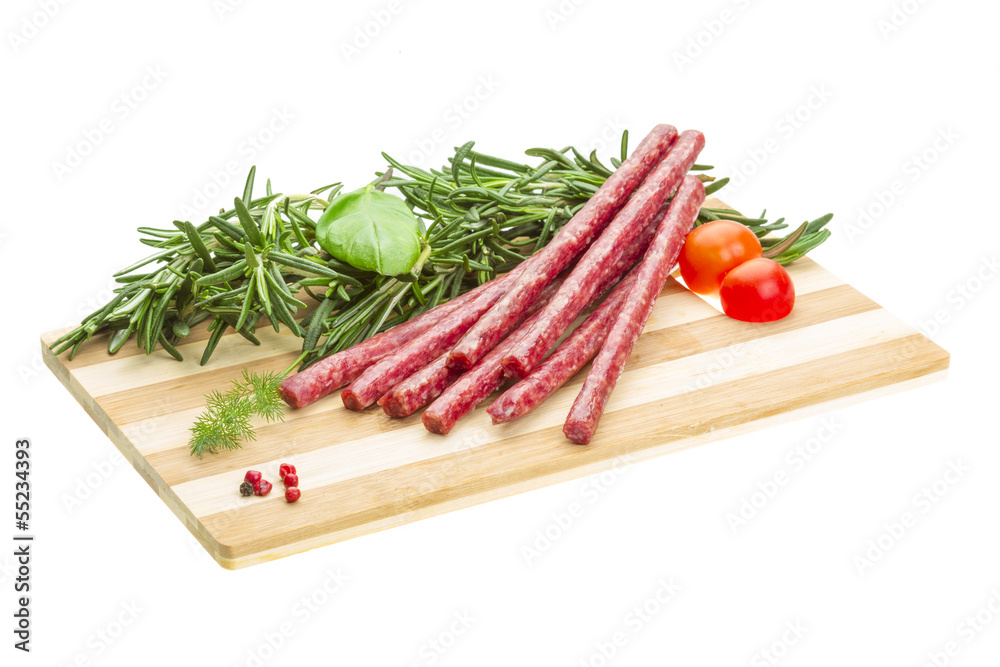 Salami with rosemary, basil and tomato