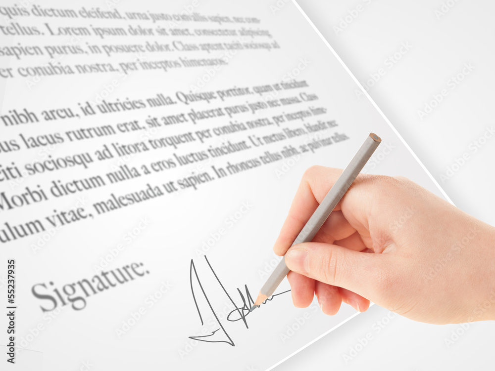 Hand writing personal signature on a paper form Hand writing personal signature on a paper form