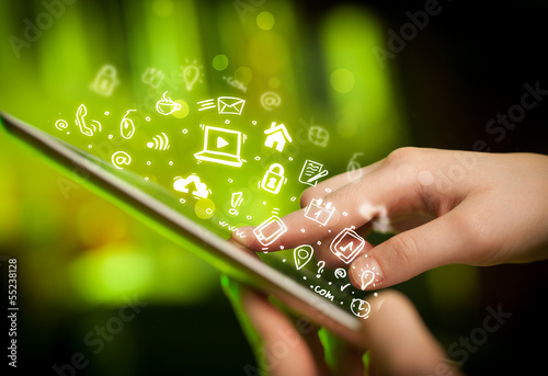 Finger pointing on tablet pc, social media concept