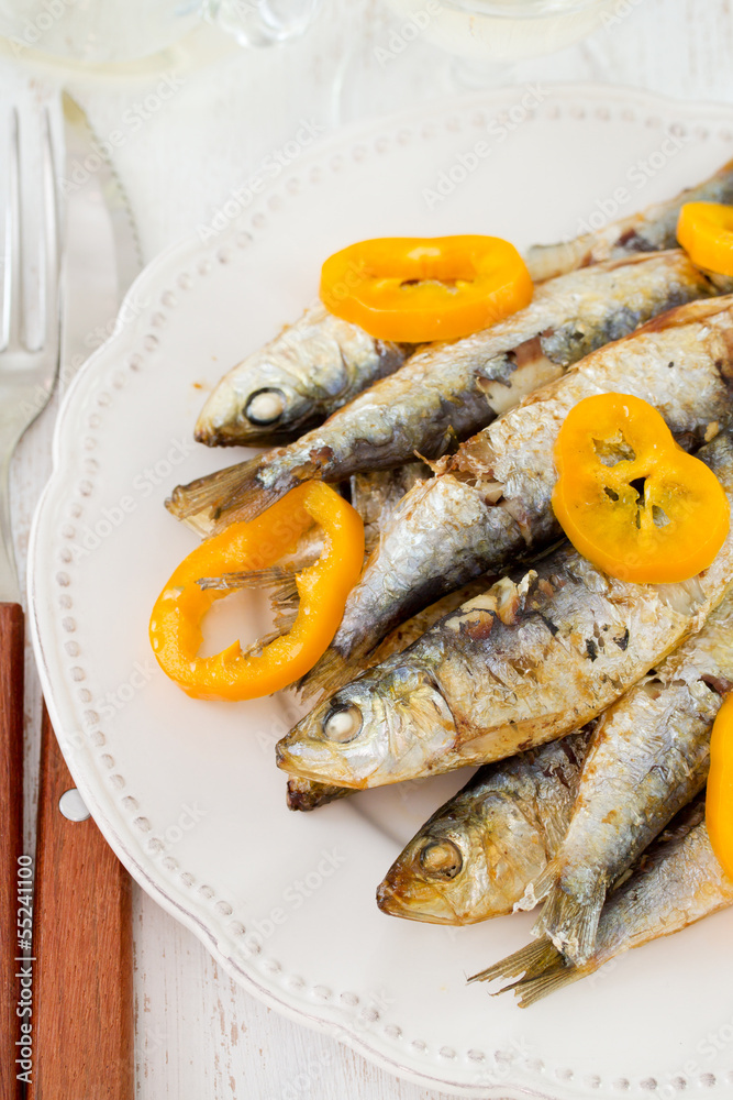 sardines with pepper on the plate