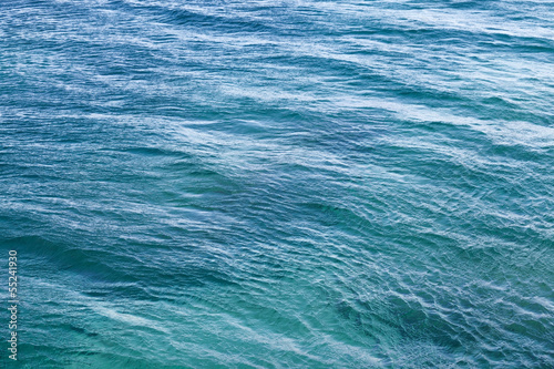 Bright Adriatic sea water background texture