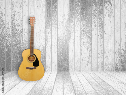 Guitar in old room background © geargodz