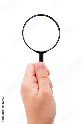 Hand holding magnifying glass © Vankad