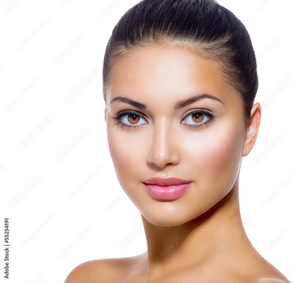 Beautiful Face of Young Woman with Clean Fresh Skin Beautiful Face of Young Woman with Clean Fresh Skin