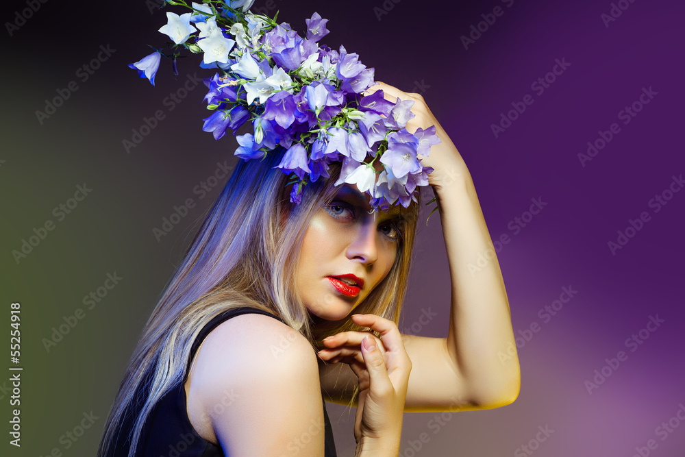 Naklejka premium Woman withwith flower wreath. Professional Makeup and hairstyle