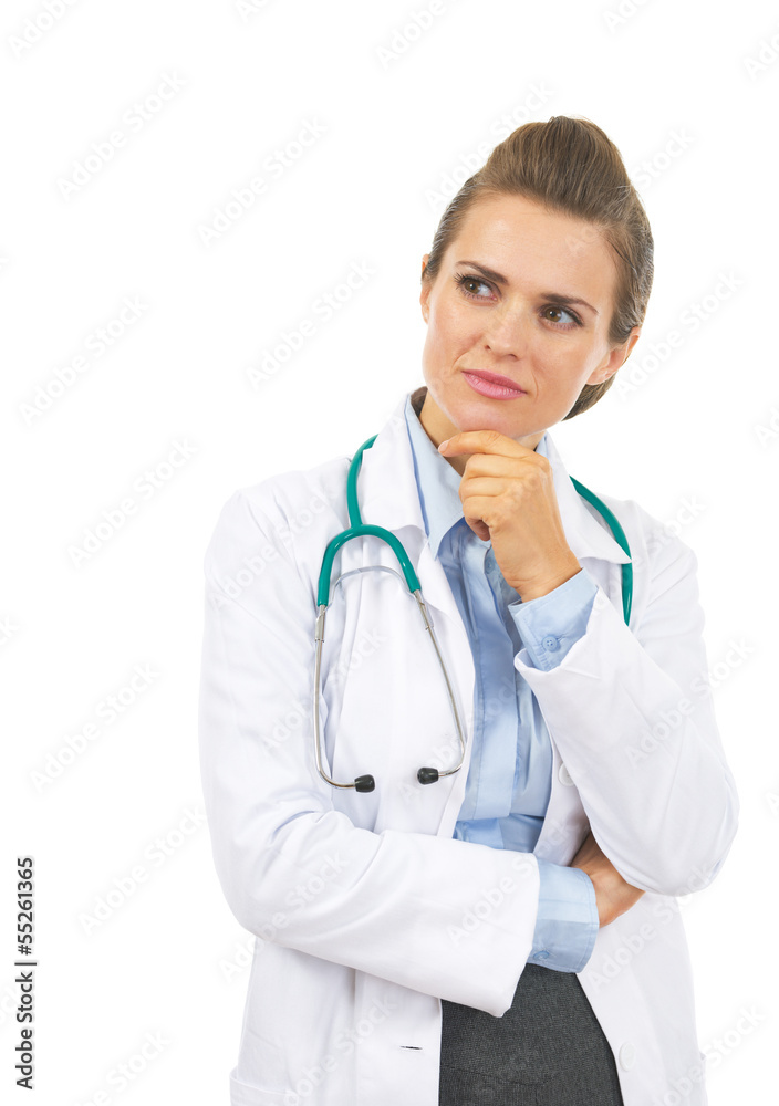 Thoughtful doctor woman looking on copy space Thoughtful doctor woman looking on copy space
