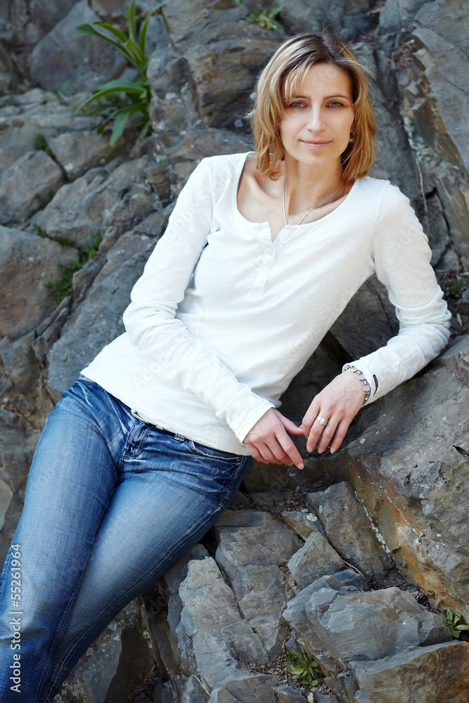 Portrait of smiling woman in a park