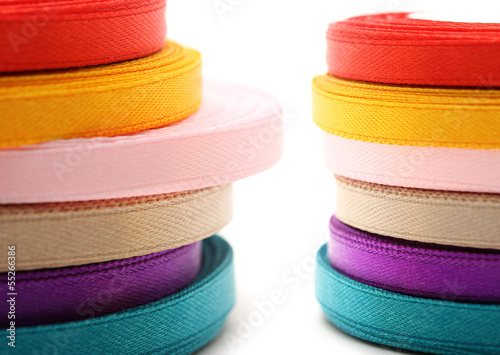 Reels of ribbon on the white background