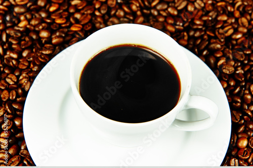 Steaming hot cup of black coffee
