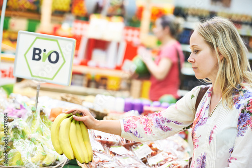 woman at food shopping in store photo