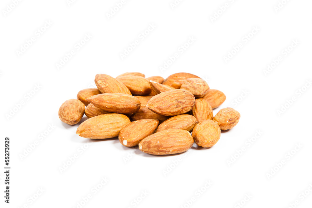 Heap of almond nuts isolated on white background Heap of almond nuts isolated on white background