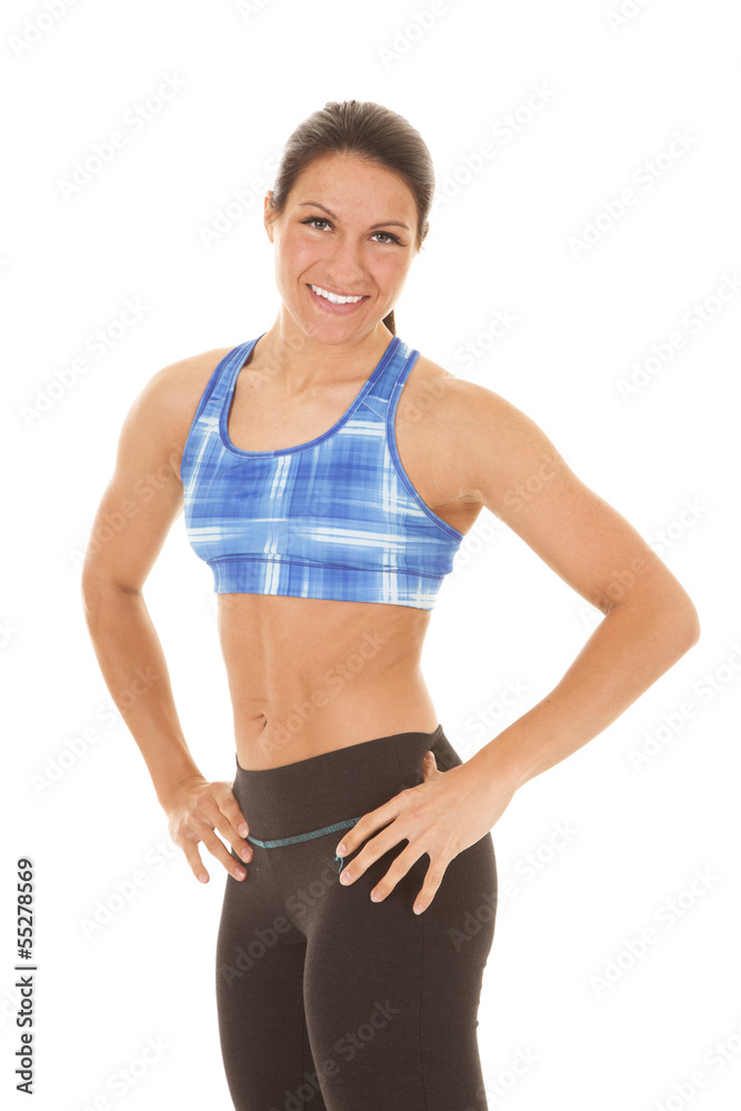 Woman blue plaid halter top hands on hips