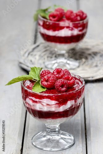 Raspberry dessert on wooden table