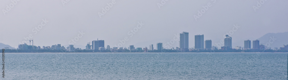 Panorama of the big city. The review from the sea on beaches and