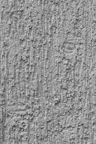 The texture of the gray plaster on the wall