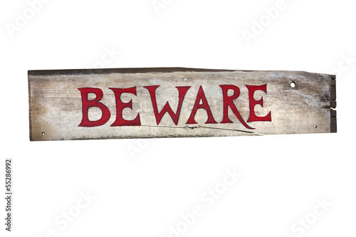 wooden sign that says beware