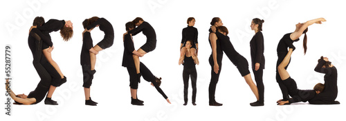 people standing over white forming SPRING word