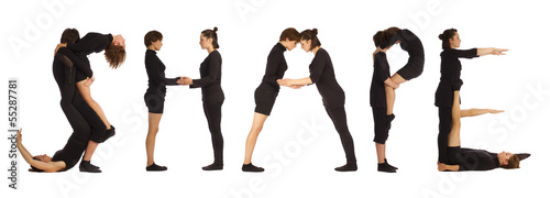 people standing over white forming SHAPE word