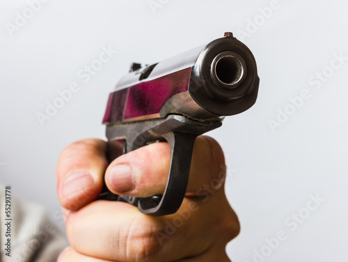  man with a black gun in his hand