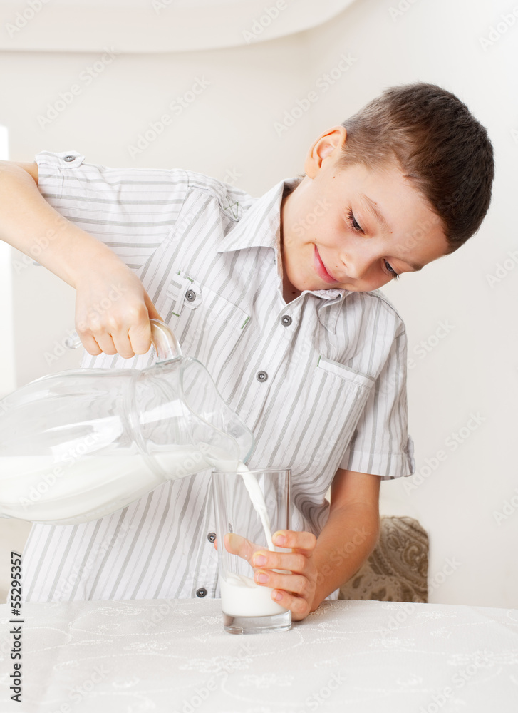 Child with glass pitcher milk Child with glass pitcher milk
