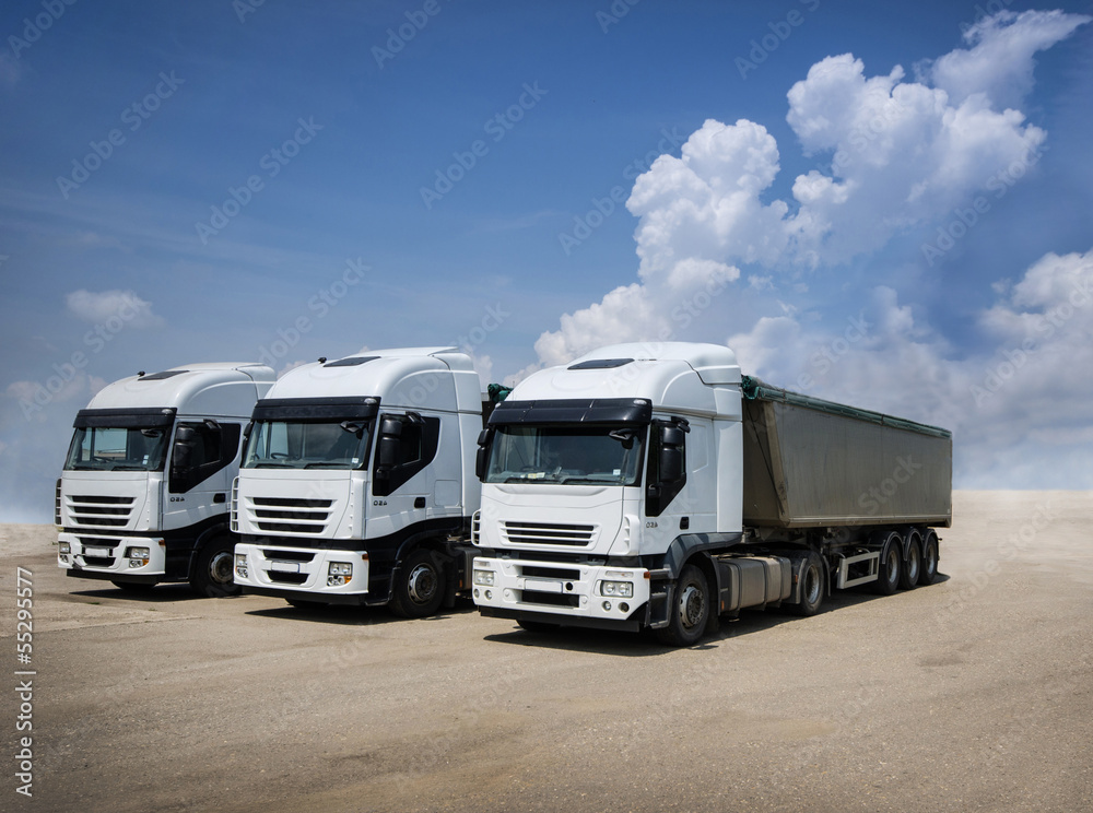 white parked trucks white parked trucks