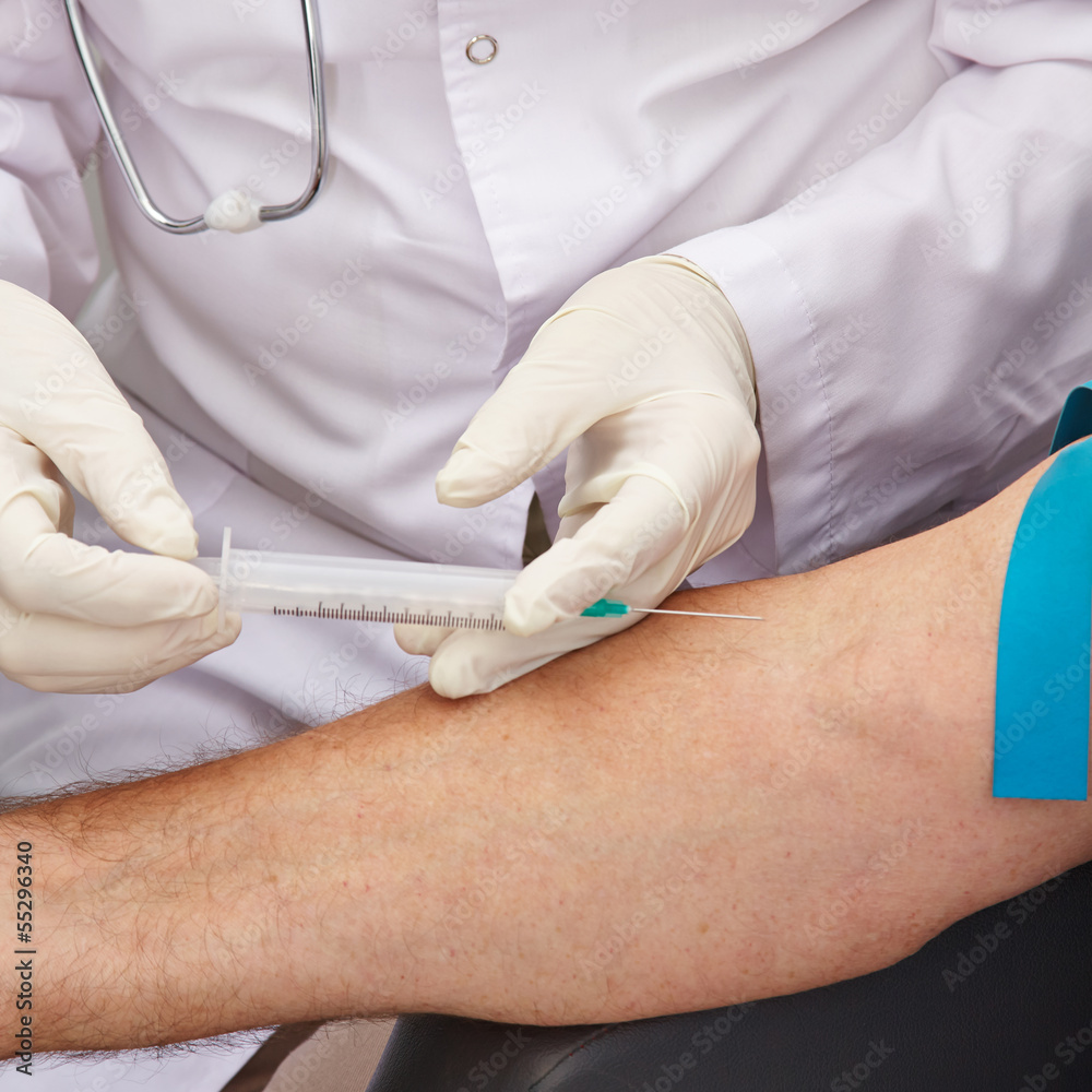Blutabnahme am Arm mit Spritze Stock Photo Adobe Stock
