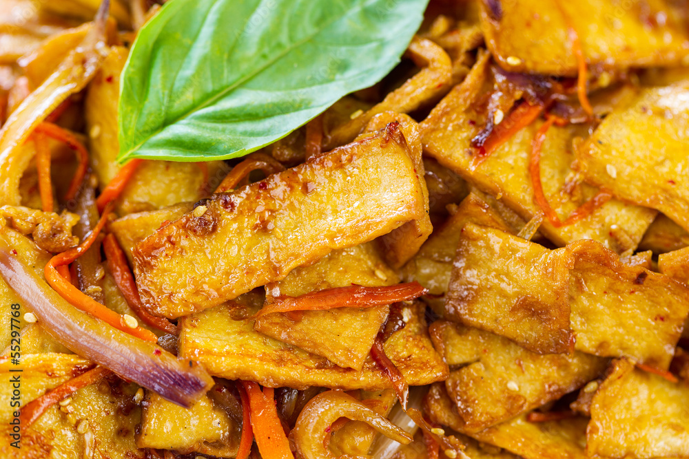 Fried Tofu in Spicy Sauce with Herbs and veggies Fried Tofu in Spicy Sauce with Herbs and veggies