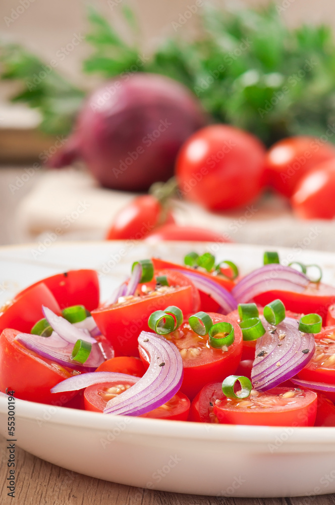 tomato cherry salad with  black pepper and onion