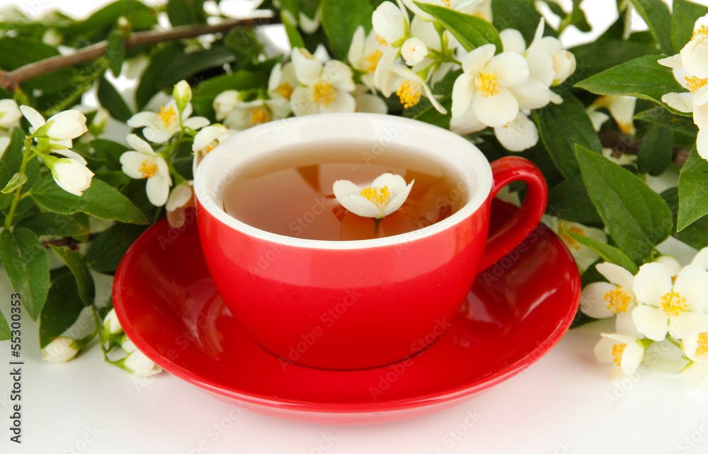 Cup of tea with jasmine, isolated on white Cup of tea with jasmine, isolated on white
