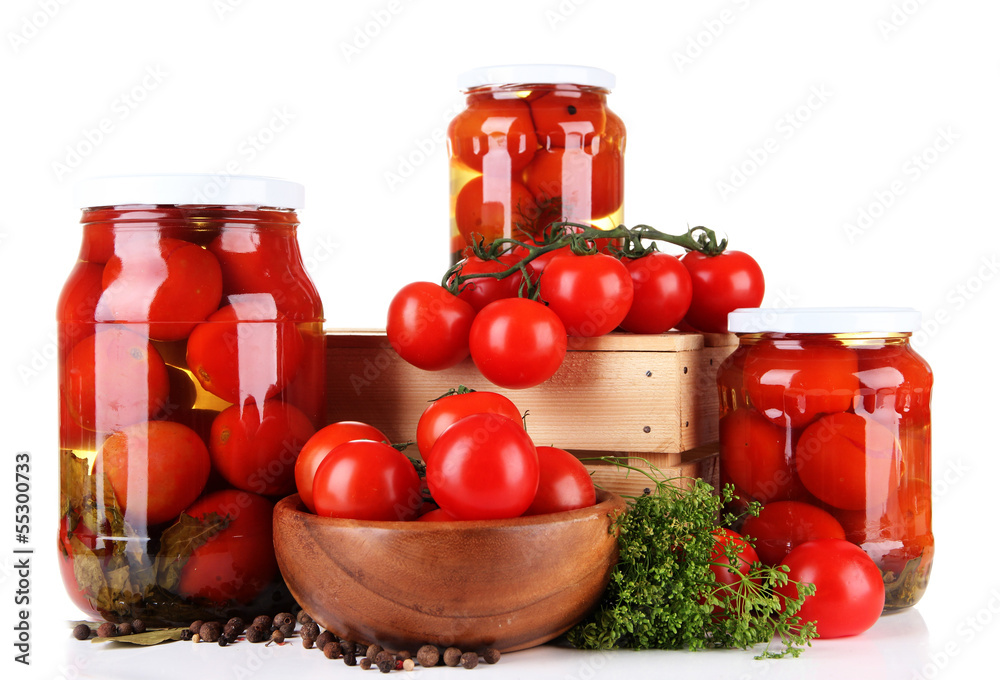 Tasty canned and fresh tomatoes, isolated on white Tasty canned and fresh tomatoes, isolated on white