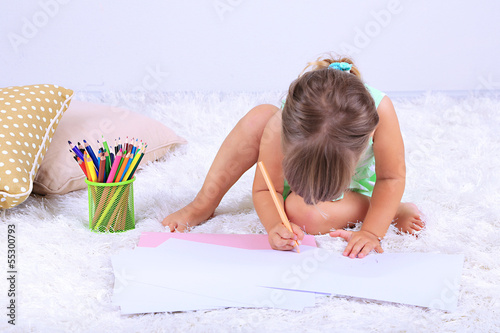 Little cute girl sitting