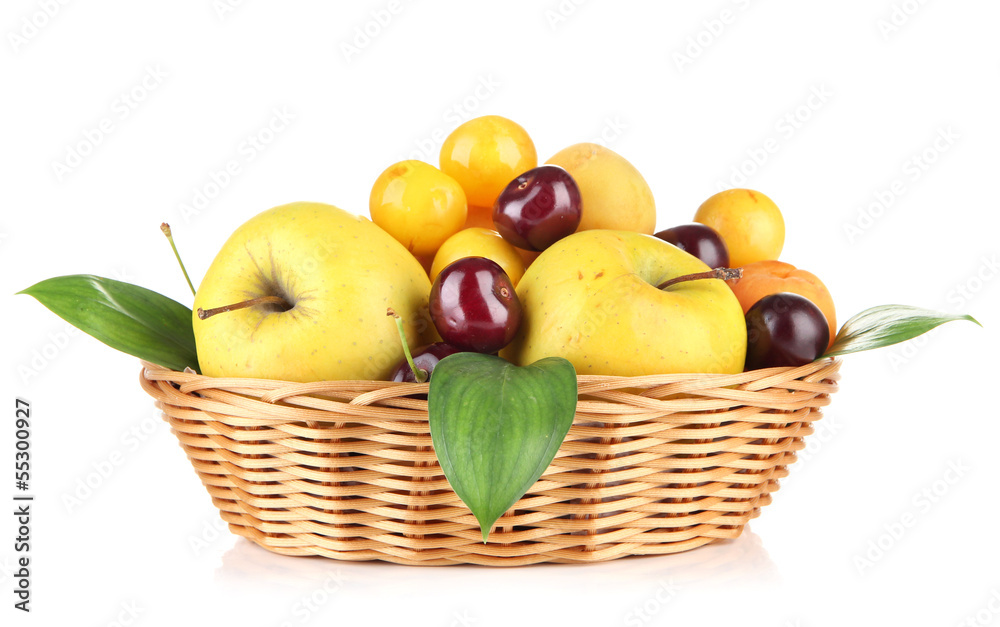 Bright summer fruits in basket isolated on white Bright summer fruits in basket isolated on white