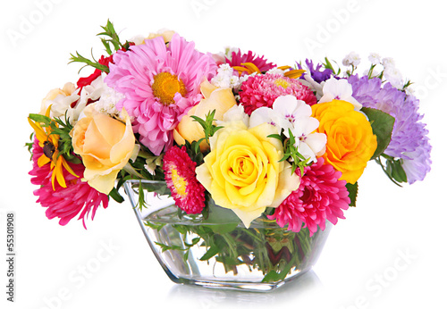 Fototapeta Naklejka Na Ścianę i Meble -  Beautiful bouquet of bright flowers in glass vase, isolated