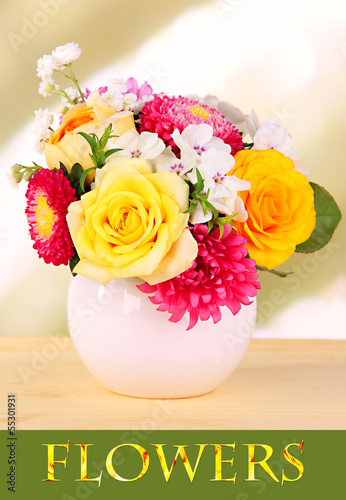 Fototapeta Naklejka Na Ścianę i Meble -  Beautiful bouquet of bright flowers in vase on bright