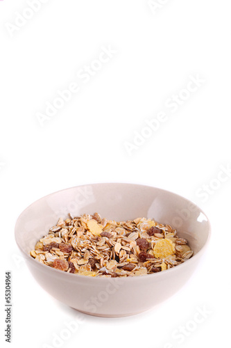 Cereal muesli in brown bowl