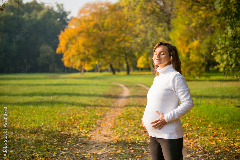 Expecting - pregnant woman outdoor Expecting - pregnant woman outdoor