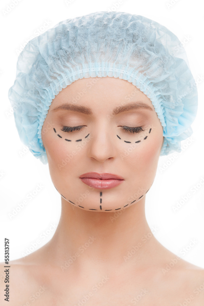Before plastic surgery. Beautiful young woman in medical headwea Before plastic surgery. Beautiful young woman in medical headwea