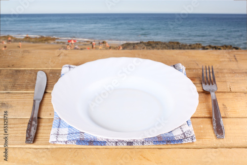 plato en la playa