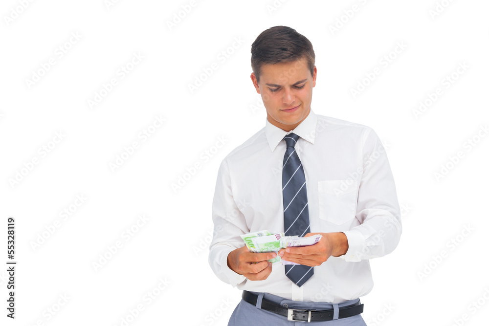 Businessman counting cash