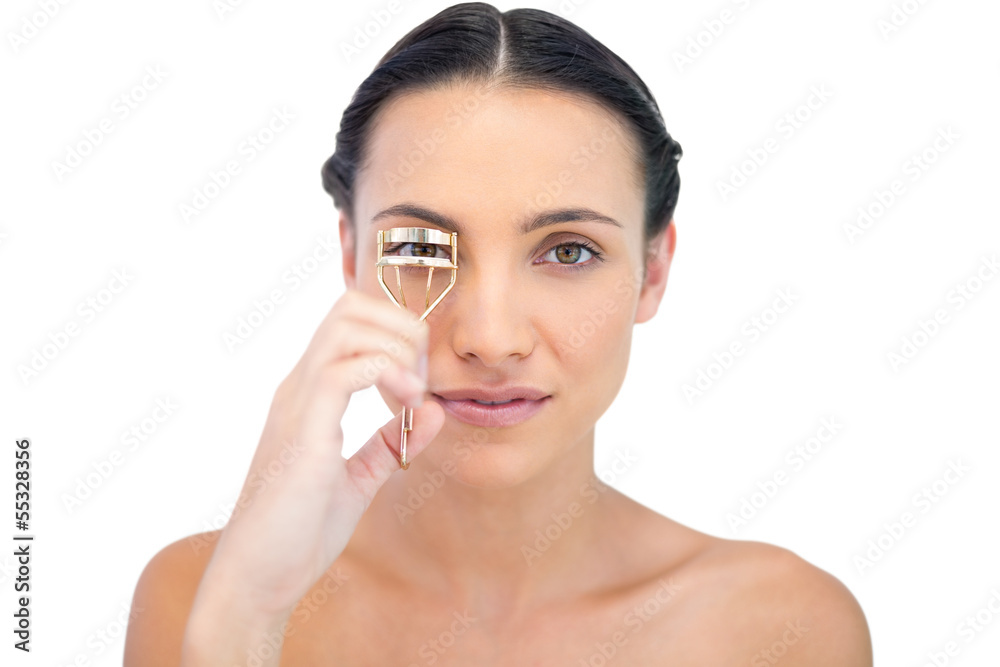 Delightful natural brunette using eyelash curler Delightful natural brunette using eyelash curler