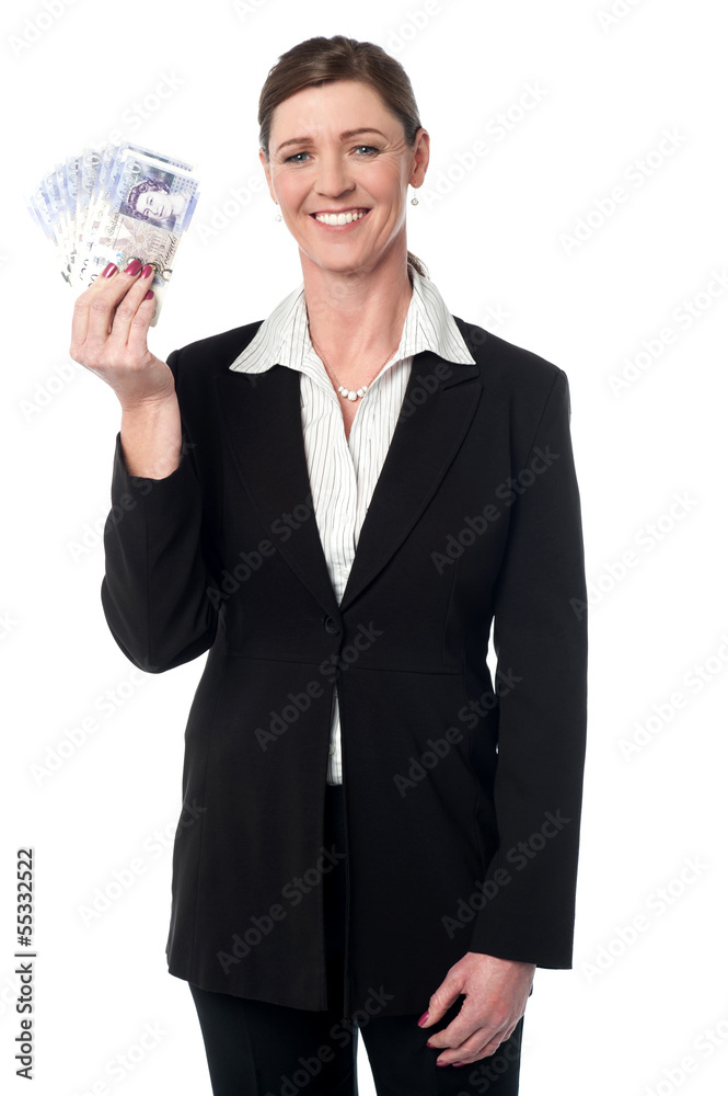 Corporate lady displaying fan of Pound Sterling Corporate lady displaying fan of Pound Sterling