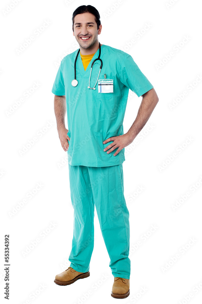 Young male physician posing casually Young male physician posing casually