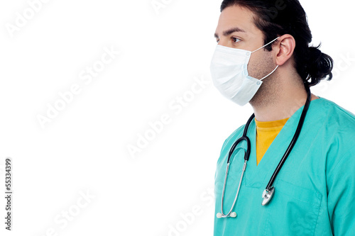 Male surgeon with face mask