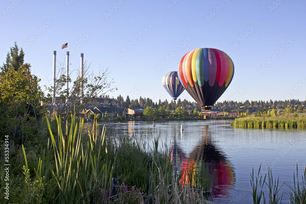 Naklejka premium Rainbow hot air balloon in The Old Mill district, Bend, Oregon