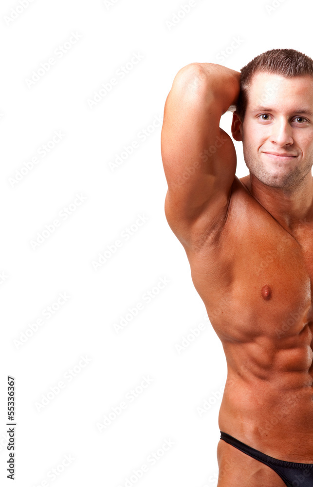 bodybuilder posing-show his abs bodybuilder posing-show his abs