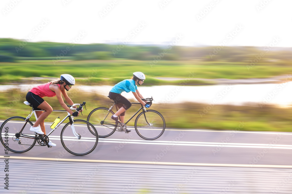 Fototapeta premium Two caucasian sports women exercising outside