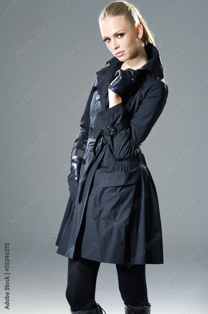 fashion girl posing on gray background fashion girl posing on gray background