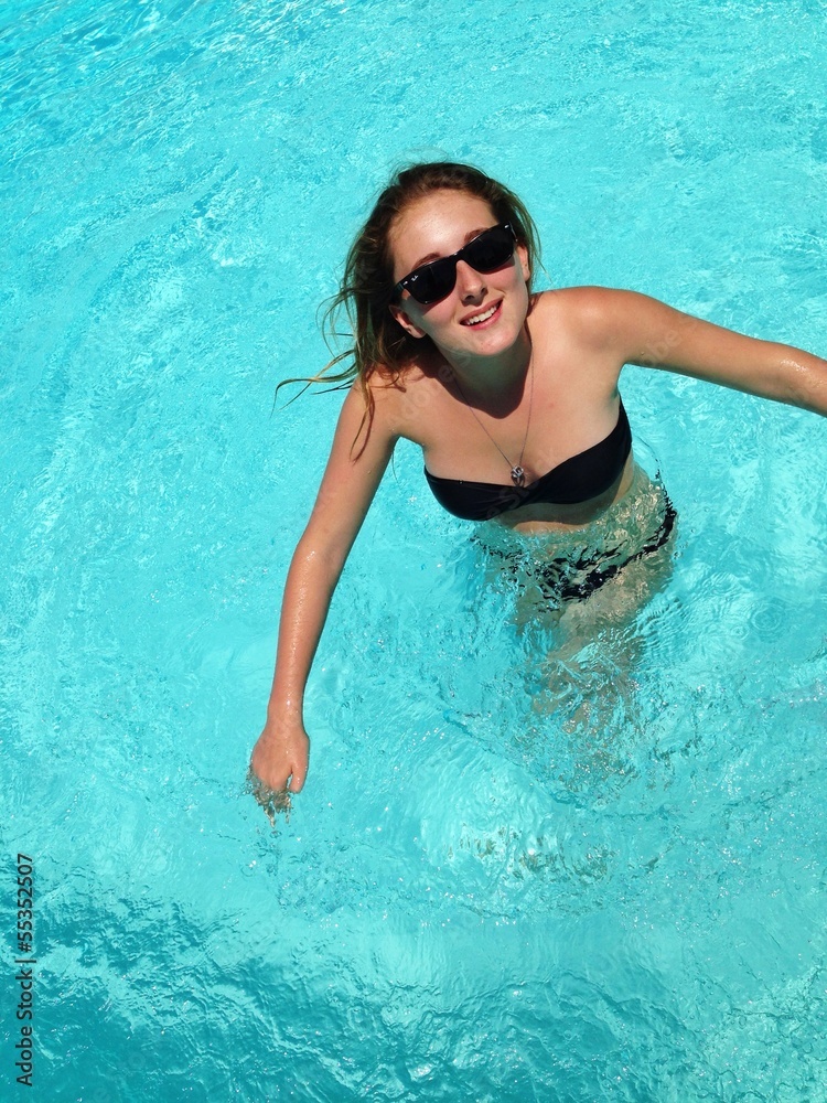 girl splashing in water