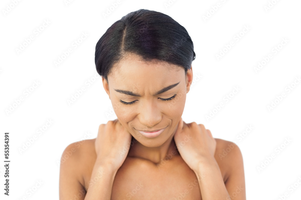 Cute woman suffering from painful neck
